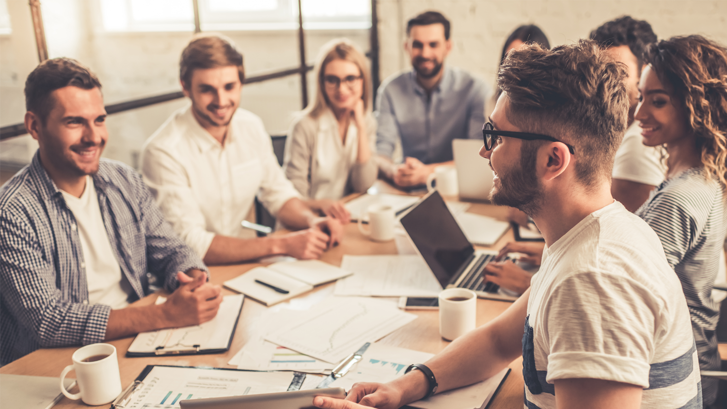 team have a meeting in a meeting room